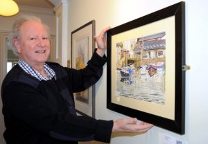 Northern artists' exhibition at Haworth Art Gallery, Accrington. Pictured is Terence Jorgensen of Barnoldswick, winner of the Garstang & district open art exhibition 2016, showing one of his works. The exhibition runs until 1 May.